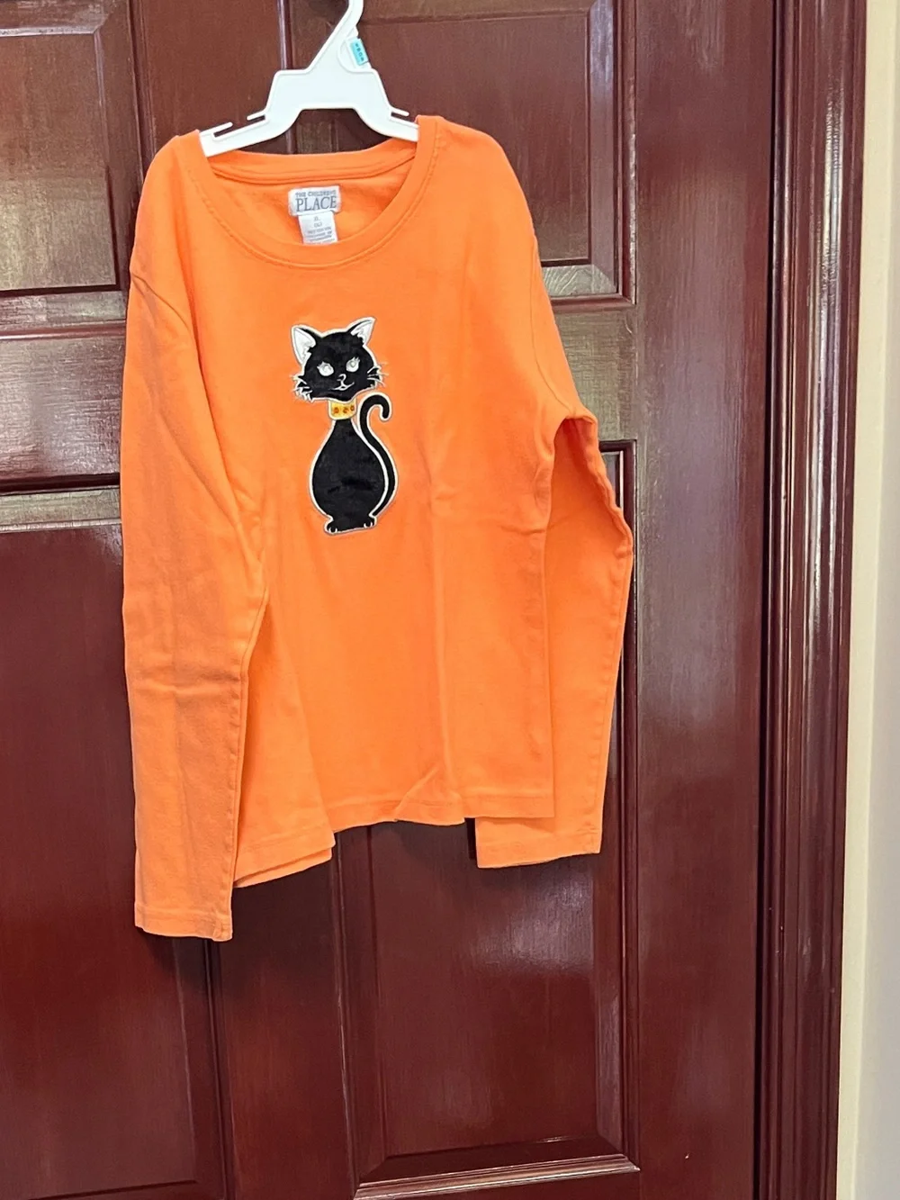 The Children's Place Orange long sleeve shirt, with Black velvet Cat Appliqué.